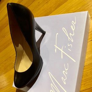 Black leather Marc Fisher pumps.